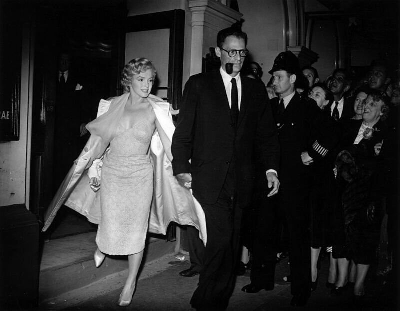 Marilyn Monroe with her third husband, American dramatist Arthur Miller. Photograph: Express