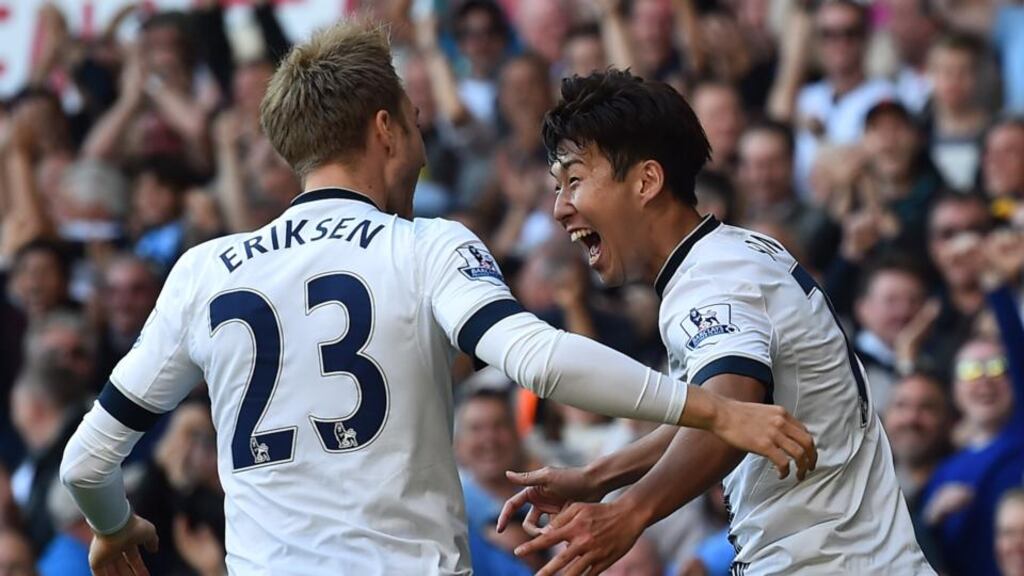 Tottenham Hotspur’s South Korean striker Son Heung-Min celebrates with Christian Eriksen after scoring the opening goal of their Premier League match against Crystal Palace at White Hart Lane. Photo: Ben Stansall/AP