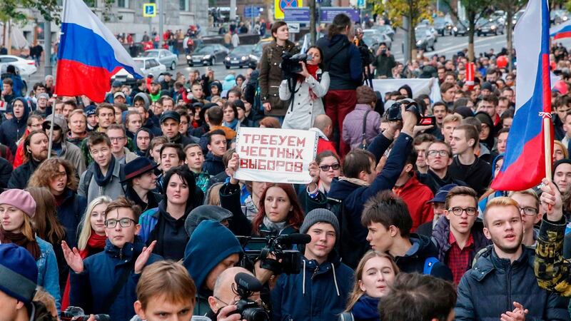Demonstrators attend an unauthorized anti-Kremlin rally called by opposition leader Alexei Navalny, who is serving a 20-day jail sentence, in downtown Moscow on October 7, 2017, President Vladimir Putin’s 65th birthday. Photograph: Maxim Zmeyev/AFP/Getty Images