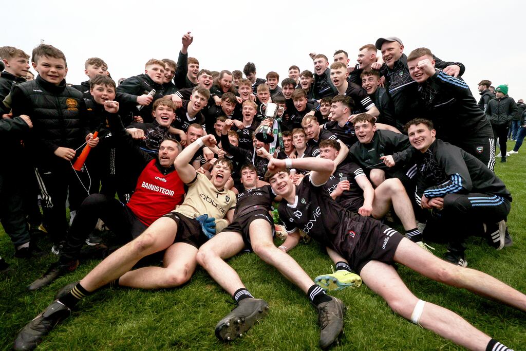 Sligo celebrate with the trophy after the game. Photograph: Laszlo Geczo/Inpho