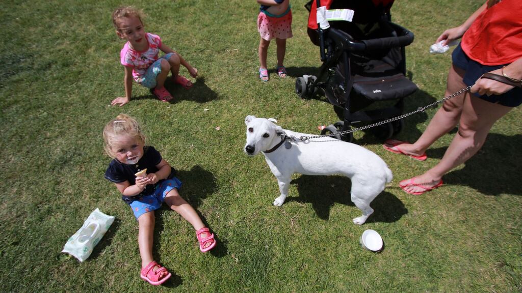 How long will it last?   Tahilia Murphy (2) and ‘Roxy’ pictured on Bray Seafront in on Monday. Photograph: Nick Bradshaw/The Irish Times.