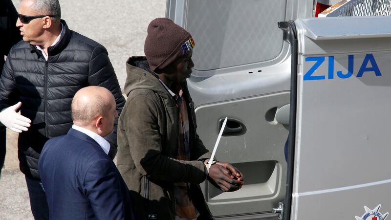 A man suspected of hijacking the merchant ship Elhiblu 1 is detained, in Senglea, in Valletta’s Grand Harbour, Malta, on Wednesday. Photograph: Darrin Zammit Lupi/Reuters