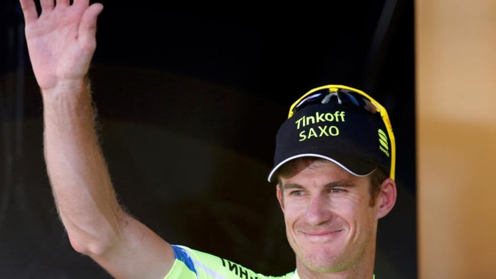 Tinkoff-Saxo team rider Michael Rogers of Australia celebrates after winning the 16th stage. Jean-Paul Pelissier/Reuters
