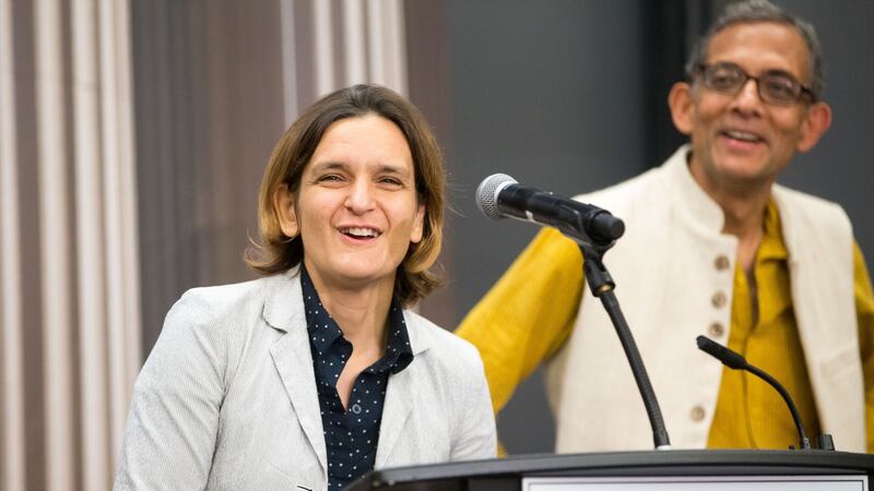 Esther Duflo and Abhijit Banerjee, who share this year’s Nobel prize for economics with Michael Kremer for their work on alleviating poverty. Photograph: Scott Eisen/Getty Images