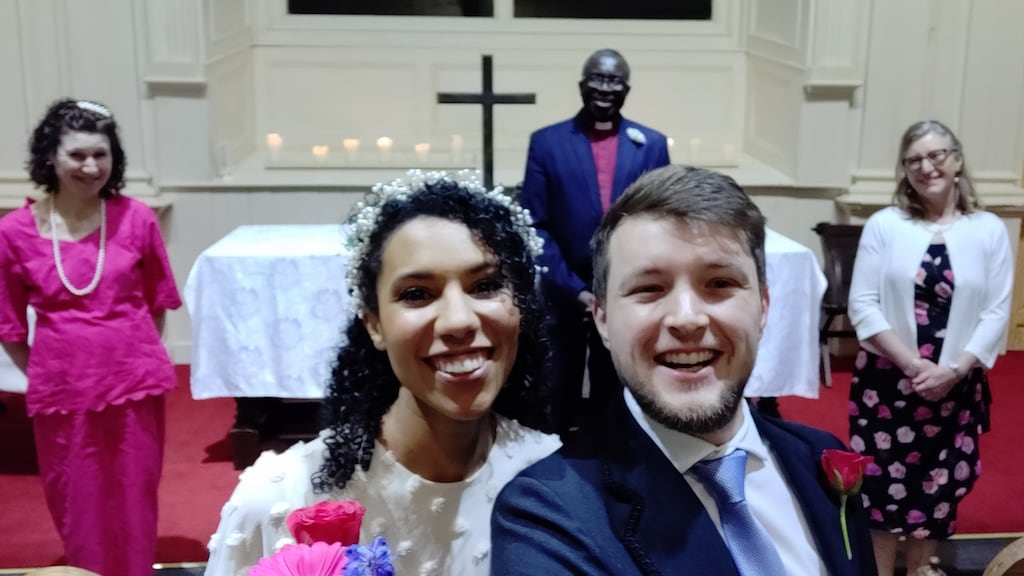 Abbie Yambasu and Brian Alcorn at their hastily arranged wedding ahead of the introduction of further restrictions on movement in response to the coronavirus pandemic.