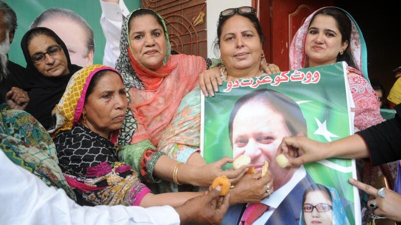 Supporters of Nawaz Sharif celebrate after a court ordered his release, in Multan, Pakistan, on Wednesday. Photograph: Faisal Kareem/EPA