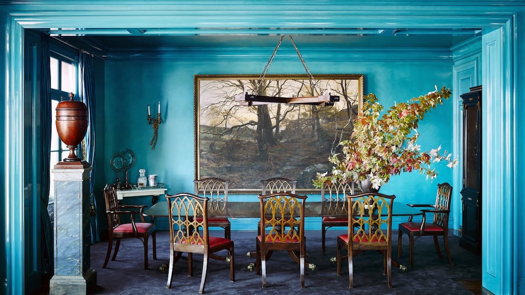 The formal diningroom at Birch Castle, which is painted in 20 coats of peacock-blue lacquer. Photograph: Douglas Friedman Photography