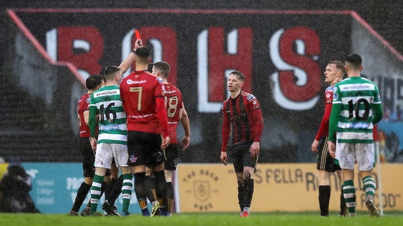Bohemians’ Andy Lyons is shown a red card by referee Rob Hennessy. Photograph: Ryan Byrne/Inpho