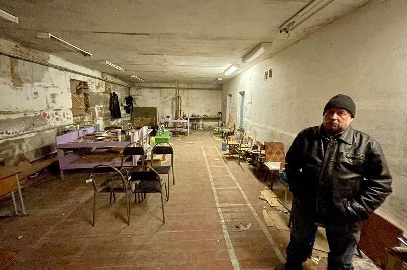 Ivan Polgui inside the school basement in Yahidne, where they were imprisoned. Photograph: Daniel McLaughlin