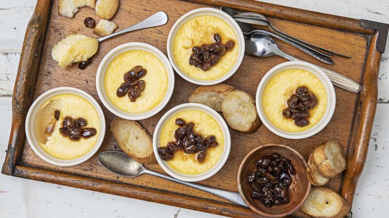 Cheddar custard pots with spiced raisins. Photograph: Harry Weir