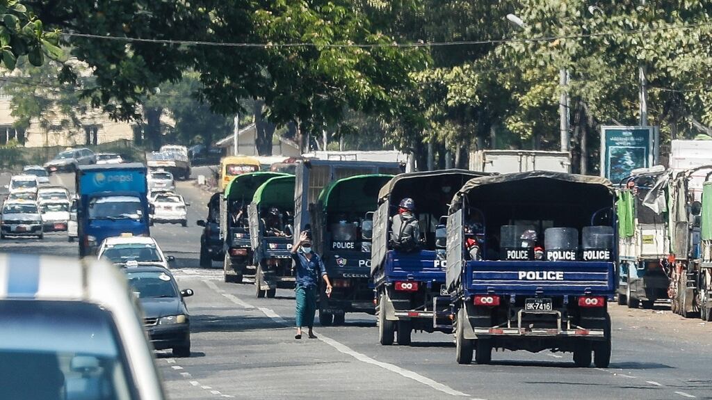 Police patrol at a street during a protest in Yangon on Monday. Photograph: EPA