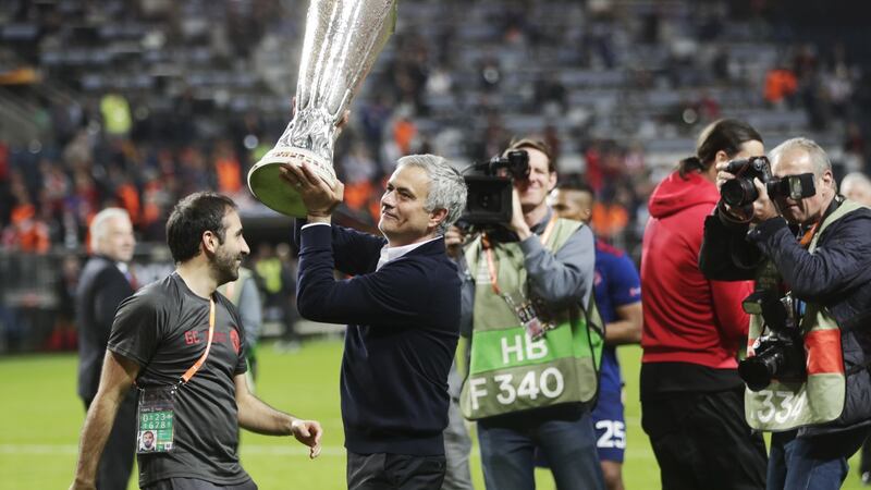 Mourinho celebrates with the Europa League trophy in 2017. Photo: Nils Petter Nilsson/Getty Images