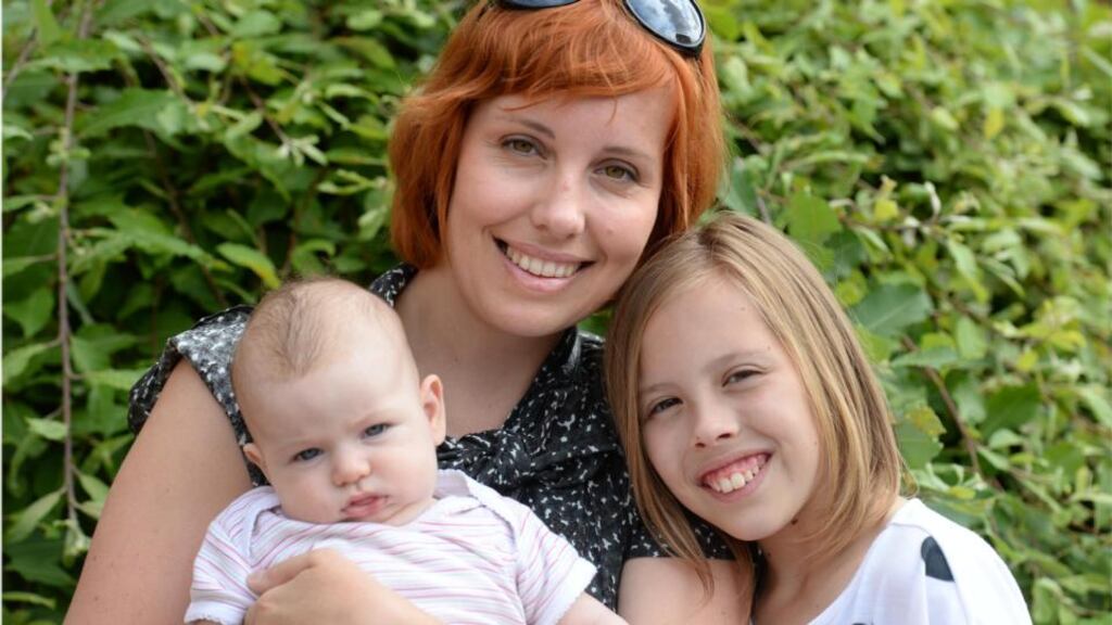 Agnieszka Matys-Foley, pictured with her children Martina and Klara, runs a weekend school. Photograph: Dara Mac Dónaill