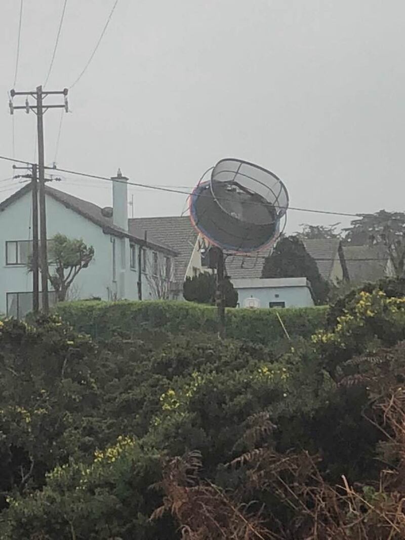 A trampoline suspended above the ground in Howth, Co Dublin, following heavy winds on Tuesday morning. Photograph: Margaret Ruxton