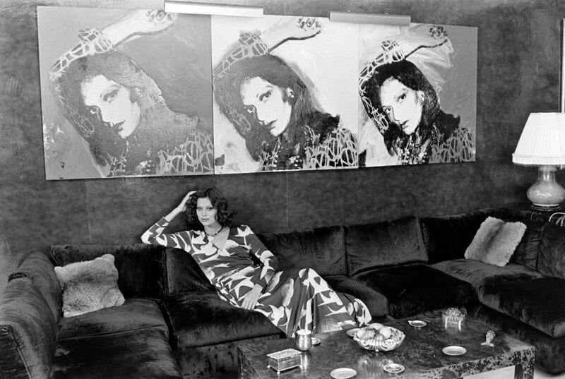 A model in von Fürstenberg’s living room, wearing a dress from her 1975 spring collection. Photograph: WWD/Penske Media/Getty Images