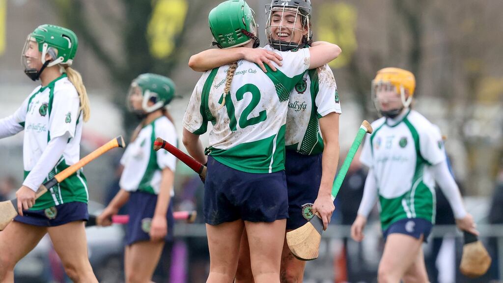Sarsfields’ Sarah Spellman and Niamh McGrath celebrate at the final whistle. Photograph: Bryan Keane/Inpho