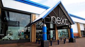 Next forecasts lower full-year sales and profit