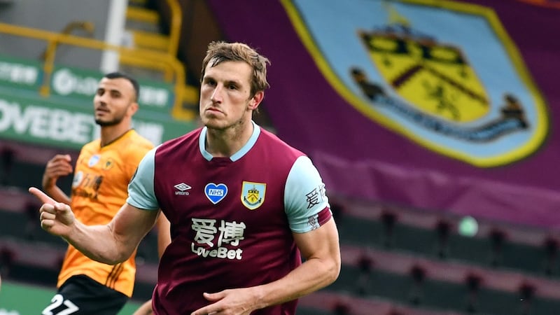 Chris Wood’s late penalty puts a dent in Wolves’ push for the top four