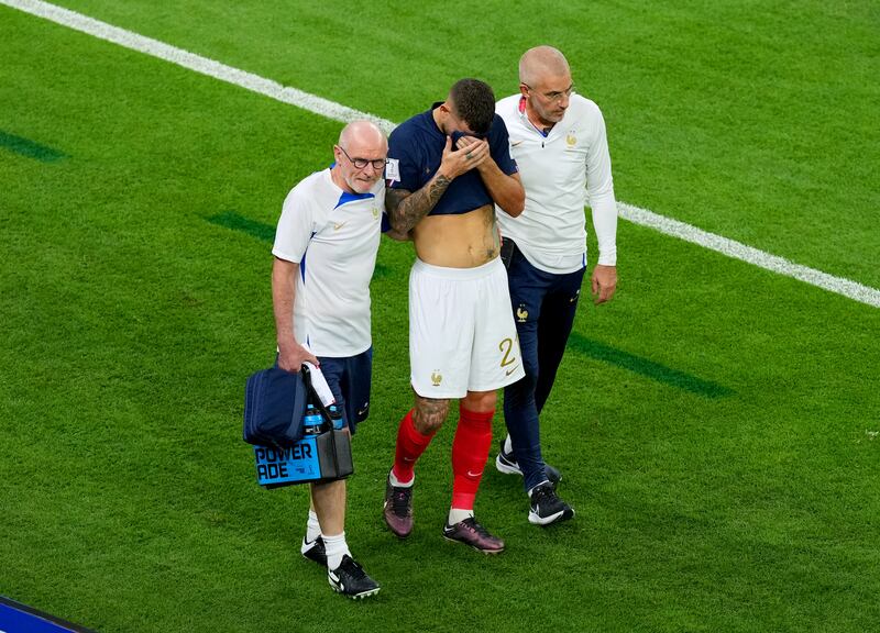 France's Lucas Hernandez leaves the pitch after picking up an injury. Photograph: Martin Rickett/PA