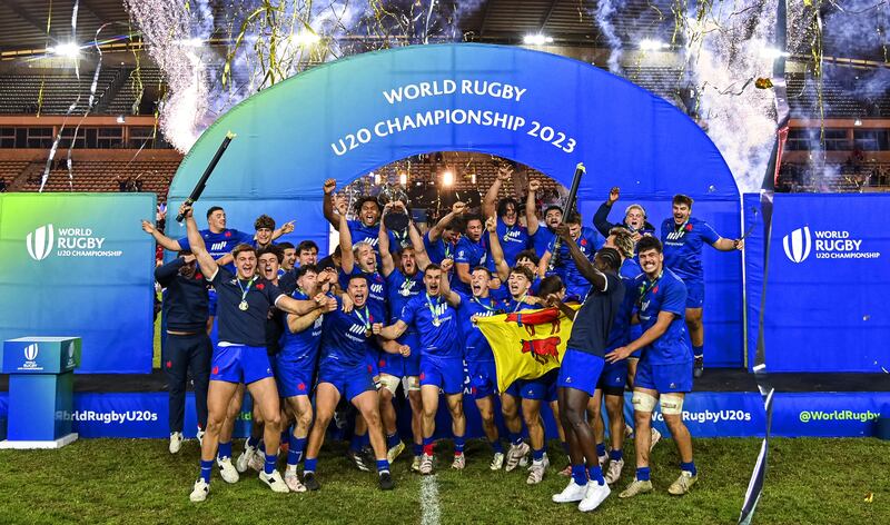 France celebrate with the trophy after Friday's win in Cape Town. Photograph: Darren Stewart/Inpho