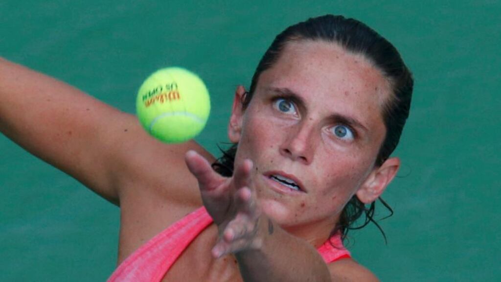 Roberta Vinci of Italy serves to compatriot Camila Giorgi at the US Open. Photograph: Reuters/Kena Betancur