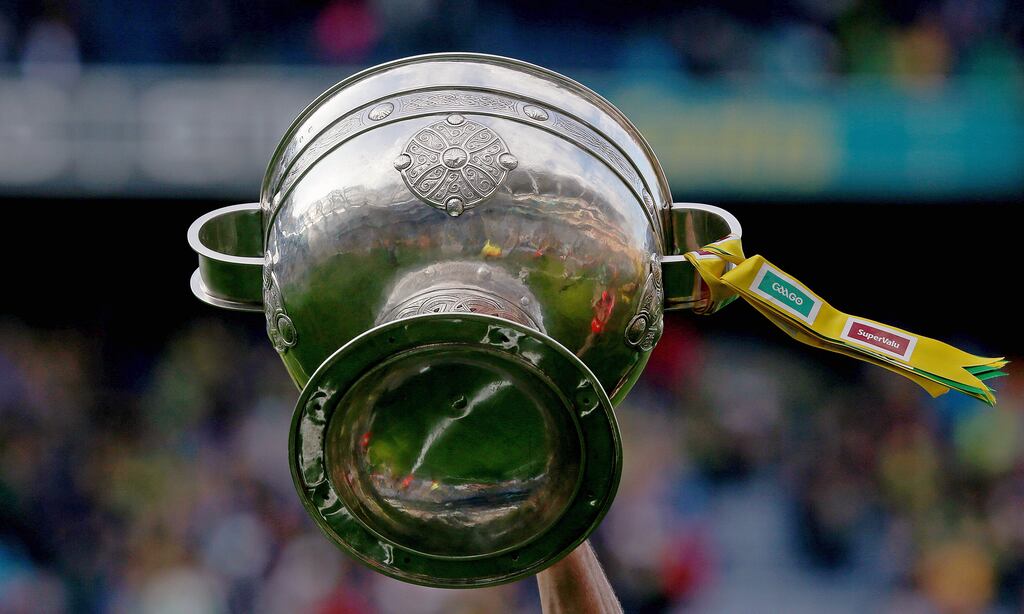 The Sam Maguire paraded around Croke Park by the Kerry team. Photograph: Donall Farmer/Inpho