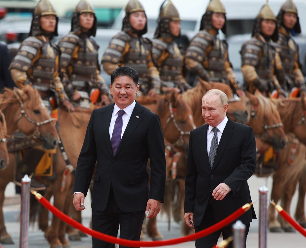 Mongolian President Ukhnaagiin Khurelsukh and Russian president Vladimir Putin in Sukhbaatar Square in Ulaanbaatar, Mongolia. Photograph: Byambasuren Byamba-Ochir/EPA