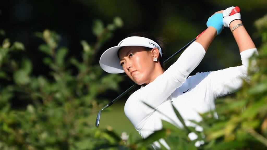 Michelle Wie of USA plays a shot during the first round of the Evian Championship in Evian-les-Bains, France, yesterday. Photograph: Stuart Franklin/Getty Images
