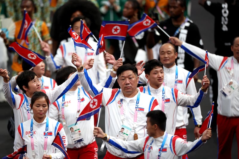 North Korean athletes during the Closing Ceremony of the Olympic Games in Paris. Photograph: Pascal Le Segretain/Getty