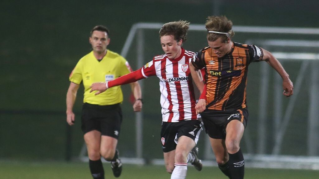 Derry’s William Fitzgerald is challenged by Dundalk’s Daniel Cleary. Photograph: Lorcan Doherty/Inpho