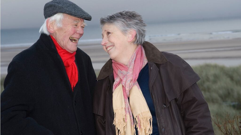 Steph Booth with her late husband, Tony on Alnmouth beach. Photograph: George Skipper
