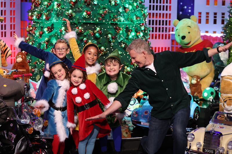 Patrick Kielty, with (from left) eight-year-old Danny Sheehan (dark blue), from Wexford; six-year-old Poppy Madden (light blue) from Carlow; six-year-old Darcy Ramsbottom (red), from Carlow; 10-year-old Layla Ibegu (yellow), from Carlow; and eight-year-old Kyle Deane (green), from Carlow. Photograph: Dara Mac Dónaill