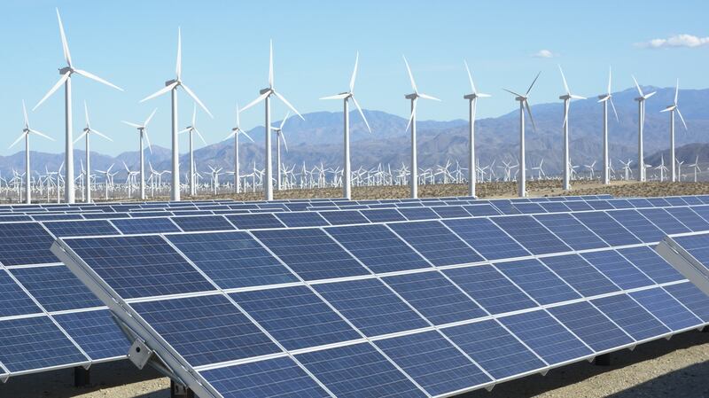 Photovoltaic solar panels and wind turbines, San Gorgonio Pass Wind Farm, Palm Springs, California, USA.