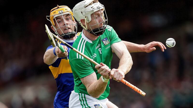 Limerick’s Cian Lynch is challenged by Ronan Maher of Tipperary during the Munster SHC Final  at the LIT Gaelic Grounds. Photograph: Laszlo Geczo/Inpho