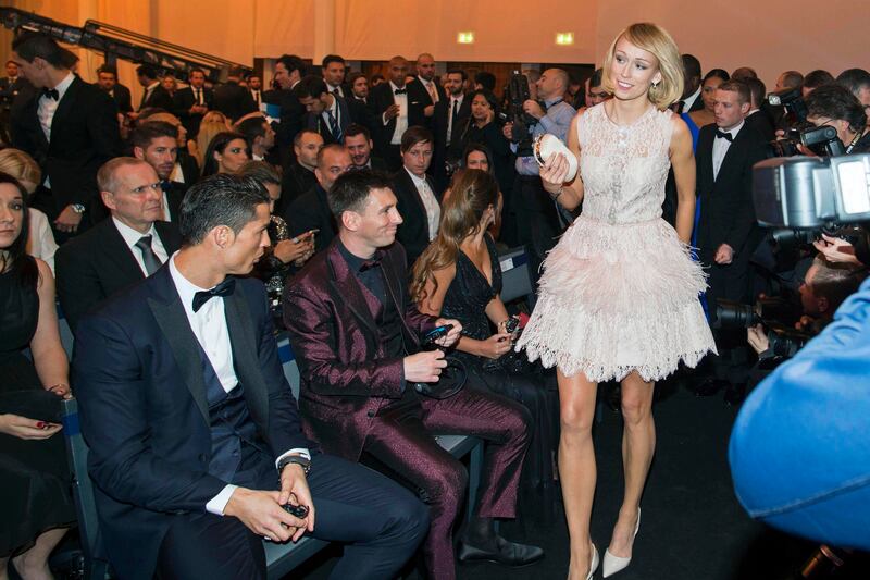 Stephanie Roche with Cristiano Ronaldo and Lionel Messi. Photograph: Valeriano Di Domenico/Inpho