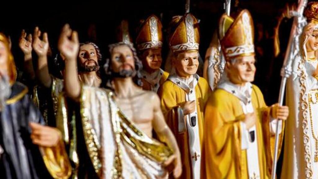Souvenirs, including one of the pope, on sale in Rome.