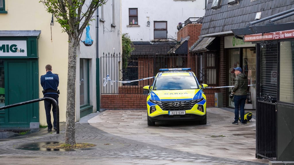 A garda outside the Abbey Court apartment complex in Tralee where a man in his 50s died after sustaining serious injuries. Photograph: Domnick Walsh