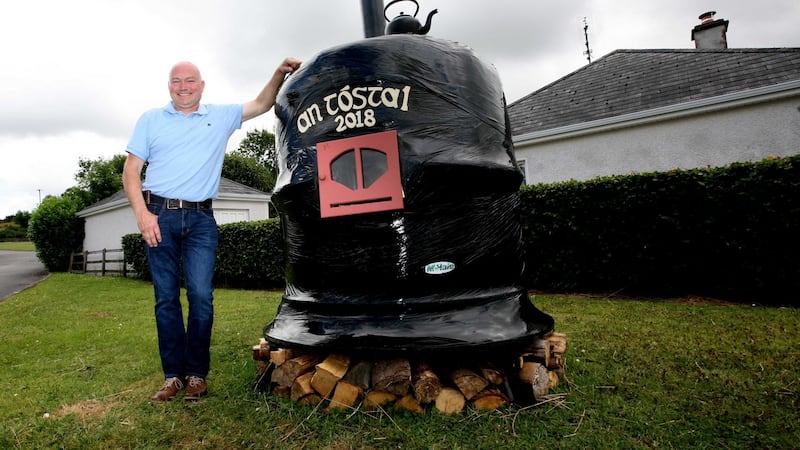 Part-time fireman Adrian Flood with his entry, the ‘Potbelly Stove’. Photograph: Brian Farrell