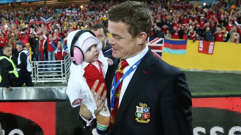 Brian O’Driscoll with his daughter Sadie after the match in Sydney. Photograph: Billy Stickland/Inpho