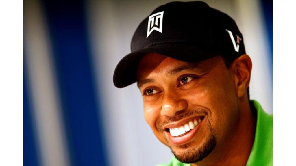 Tiger Woods speaks at a news conference for the Chevron World Challenge golf tournament in Thousand Oaks, California where Graeme McDowell and Rory McIlroy will compete (Photograph: Lucy Nicholson/Reuters)