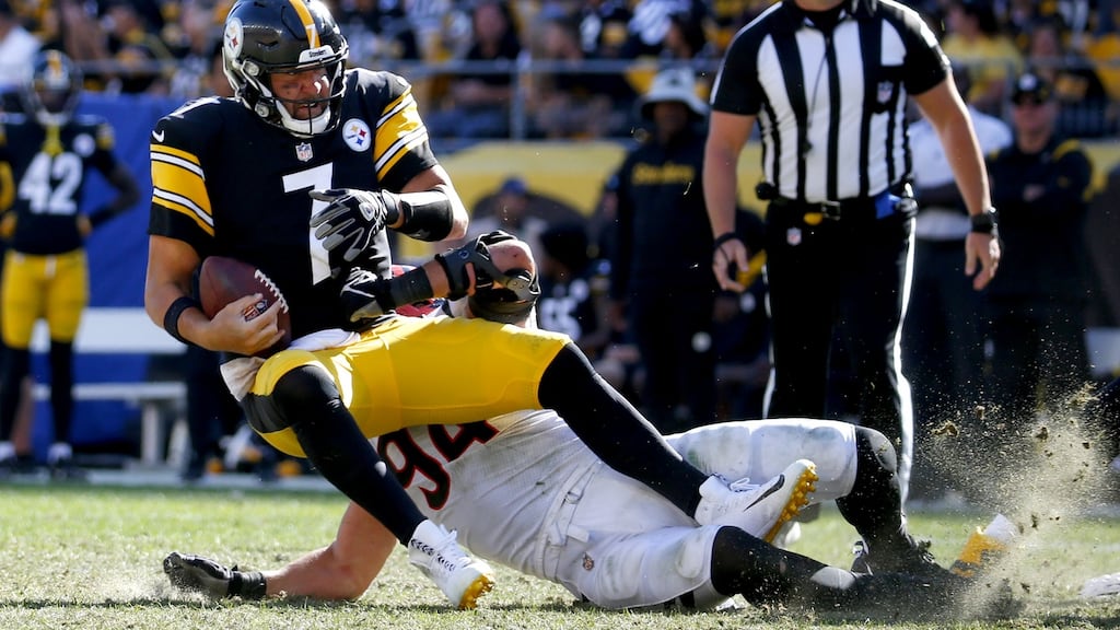 Sam Hubbard of the Cincinnati Bengals sacks Ben Roethlisberger of the Pittsburgh Steelers. Photograph by Justin K. Aller/Getty Images