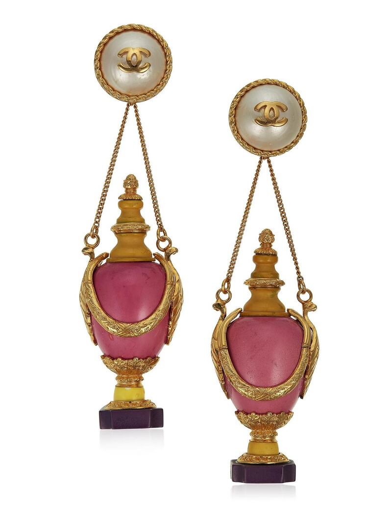 Chanel oversized faux pearl and resin earrings $3,000-$5,000.