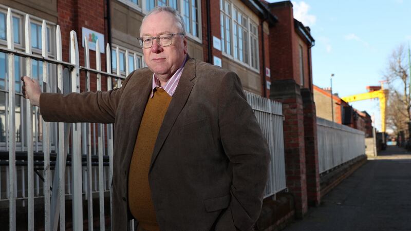Mervyn Gibson,  Presbyterian minister and  grand secretary of the Orange Lodge,  outside Templemore Primary School which is the base of community action against coronavirus in east Belfast. Photograph:  Stephen Davison