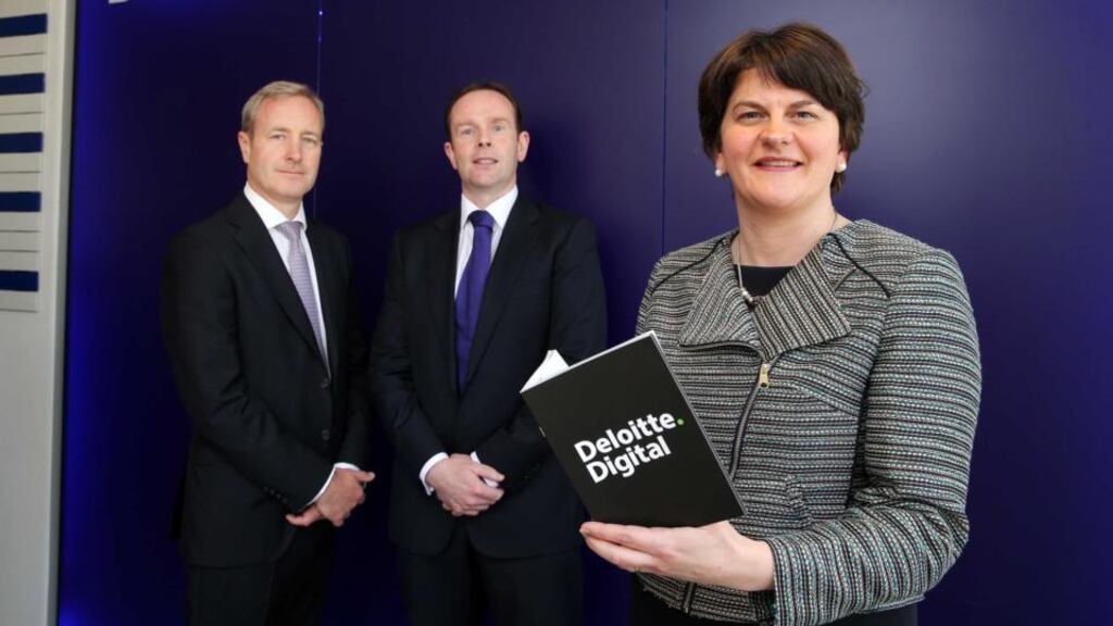 Northern Ireland Enterprise Minister Arlene Foster with Deloitte partner Kevin Walsh (left) and Deloitte technology partner Danny McConnell after it was announced that Deloitte LLP is to create 177 new jobs at its Belfast Technology Studio. Photograph: Kelvin Boyes/Press Eye /PA Wire