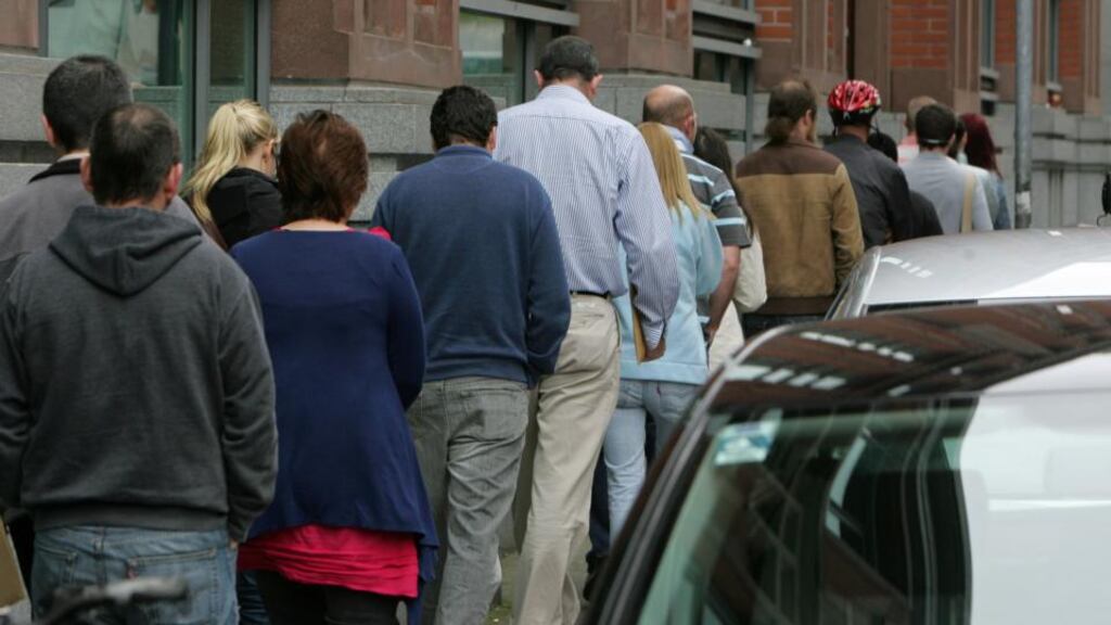 A queue for unemployment benefit outside Bishop Street social welfare office in Dublin Photograph: Frank Miller /The Irish Times
