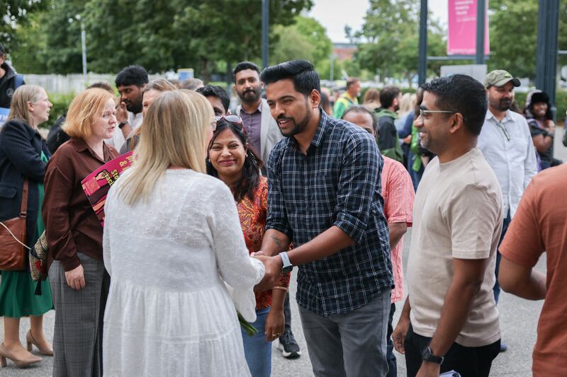 Jennifer Murray, who came to the aid of an Indian man attacked in Tallaght, meets attendees of the United Against Racism and Dublin South-West Together demonstration against racism last month. Photograph: Dan Dennison