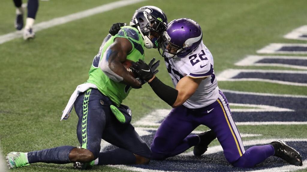 DK Metcalf of the Seattle Seahawks catches the game-winning touchdown pass against Harrison Smith of the Minnesota Vikings during the fourth quarter of the NFL game at CenturyLink Field in Seattle, Washington. Photograph: Abbie Parr/Getty Images