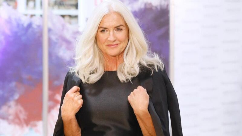 Black vintage taffeta dress with feather detail, Caroline Kilkenny, €324; Black tuxedo jacket, J. Lindeberg, €445; Shoes by Carvela