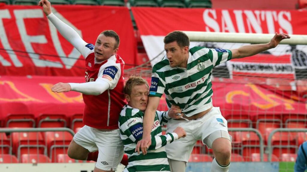 St Patrick’s Athletic’s Kenny Browne with Derek Foran and Jason McGuinness of Shamrock Rovers. Photograph: Donall Farmer/Inpho