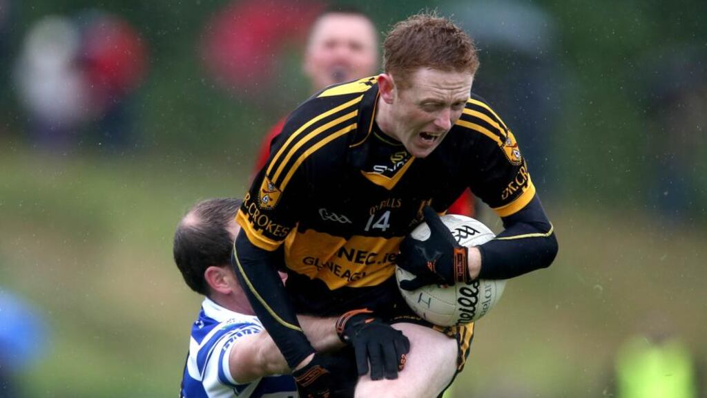 Dr Crokes’ Colm Cooper is tackled by  Dan Hegarty of Castlehaven. Photograph: Ryan Byrne/Inpho